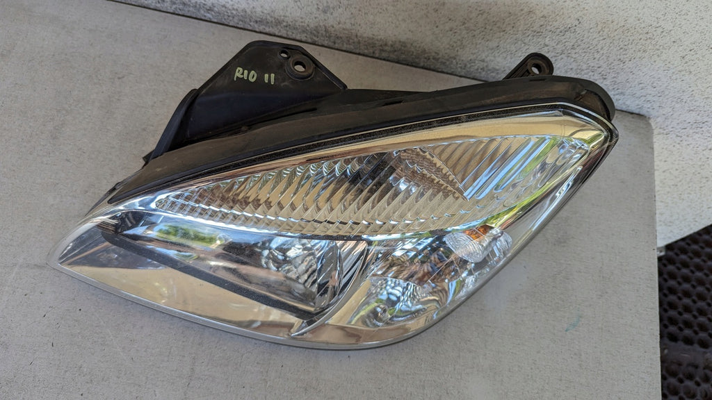 Frontscheinwerfer Kia Rio II Links Scheinwerfer Headlight