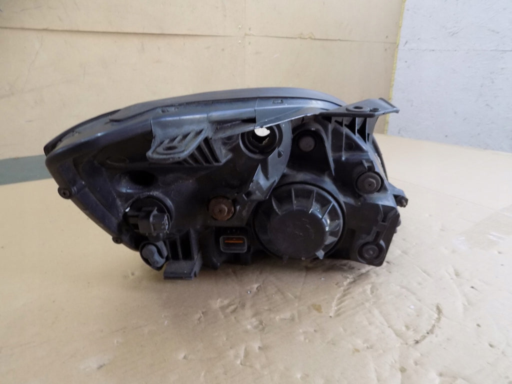 Frontscheinwerfer Kia Rio II 921011G0L Links Scheinwerfer Headlight