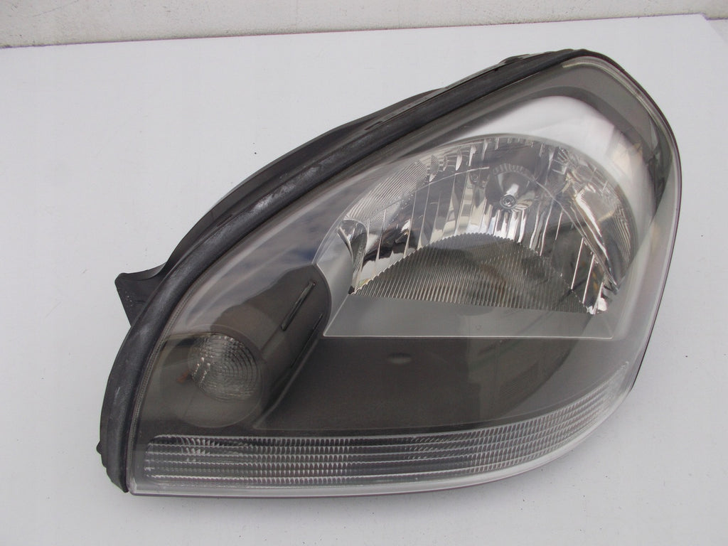 Frontscheinwerfer Hyundai Tucson 92101-2EXXX Links Scheinwerfer Headlight