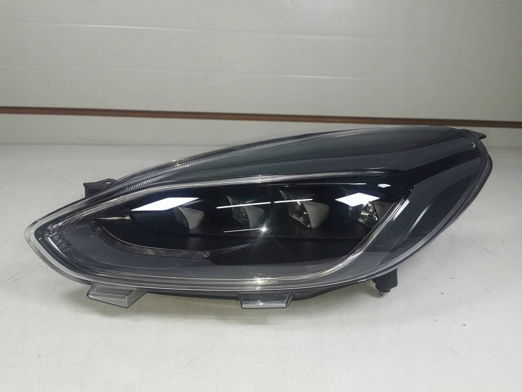 Frontscheinwerfer Ford Fiesta I H1BB13E015CF Links Scheinwerfer Headlight SCH1802570382er
