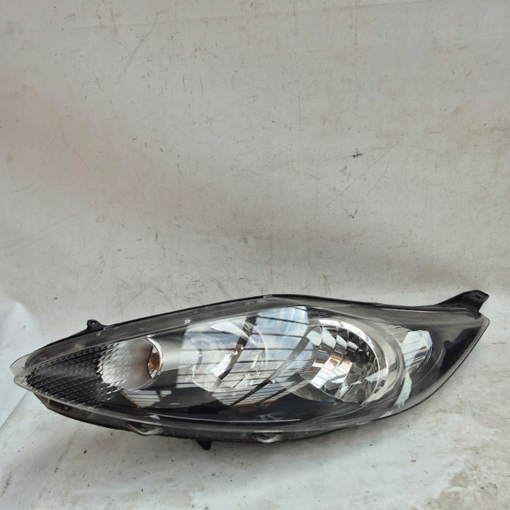 Frontscheinwerfer Ford Fiesta I 8A61-13W030-AJ Links Scheinwerfer Headlight SCH9759873910ob