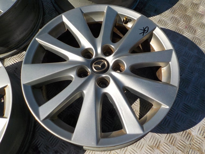 4x Alufelge 17 Zoll 7.0" 5x114.3 50ET Glanz Silber Mazda Cx-5 Cx5 Cx-3 Cx3 Mx5 FEL8480061153cn