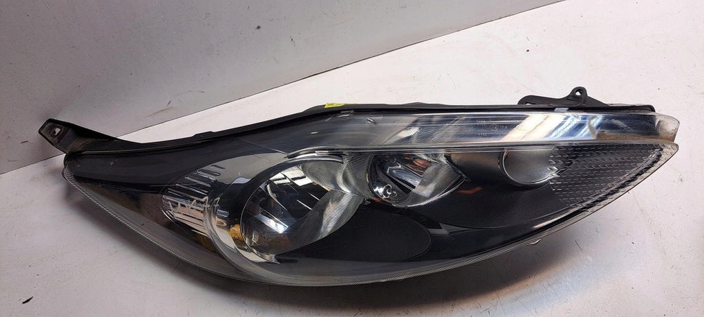 Frontscheinwerfer Ford Fiesta I 8A61-13W029-AH FALSE Scheinwerfer Headlight SCH8788680130ev