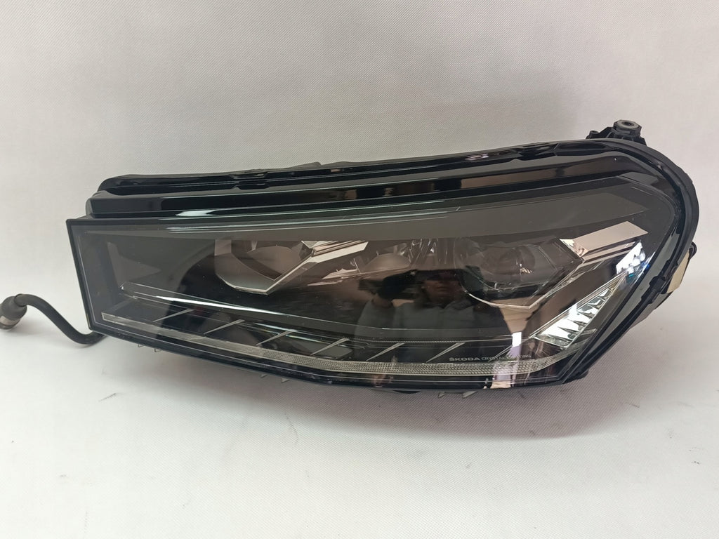 Frontscheinwerfer Skoda Fabia 6VB941015 Links Scheinwerfer Headlight SCH1315775486km
