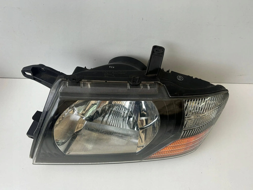 Frontscheinwerfer Mitsubishi Pajero MCJ16104 Links Scheinwerfer Headlight
