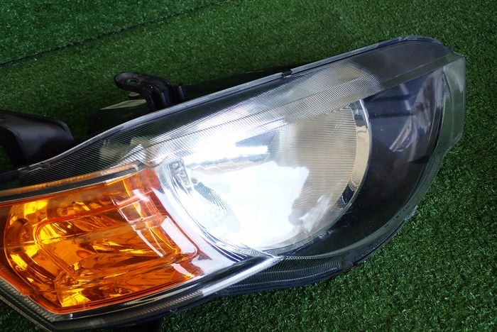 Frontscheinwerfer Mitsubishi Colt I 030124930200 Ein Stück (Rechts oder Links)