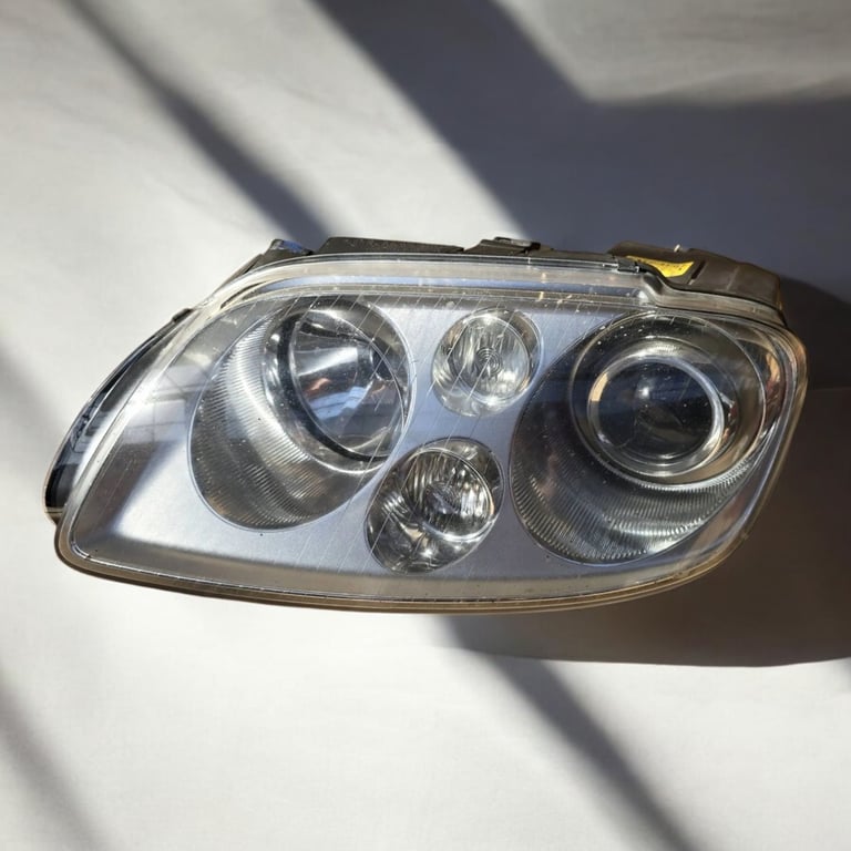 Frontscheinwerfer VW Touran 1T0941031K Links Scheinwerfer Headlight