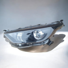 Frontscheinwerfer Toyota 4 Yaris Links Scheinwerfer Headlight SCH6791032576gr