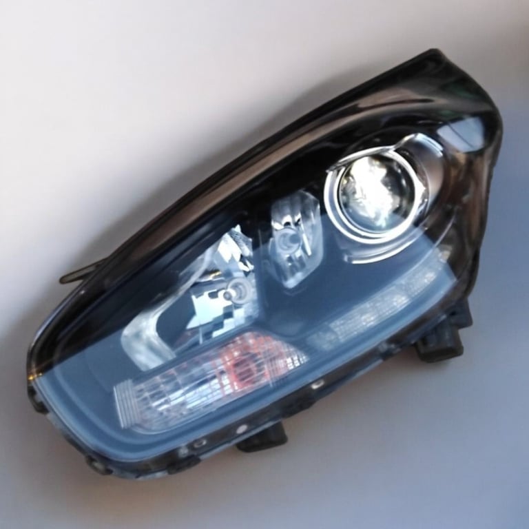 Frontscheinwerfer Kia Carens 32323 Links Scheinwerfer Headlight