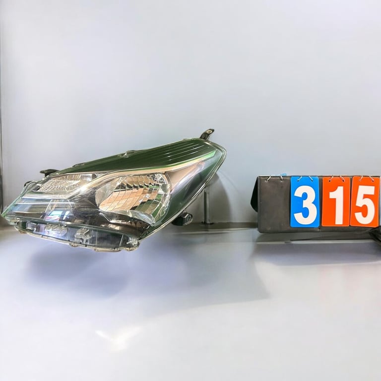 Frontscheinwerfer Toyota Yaris Links Scheinwerfer Headlight