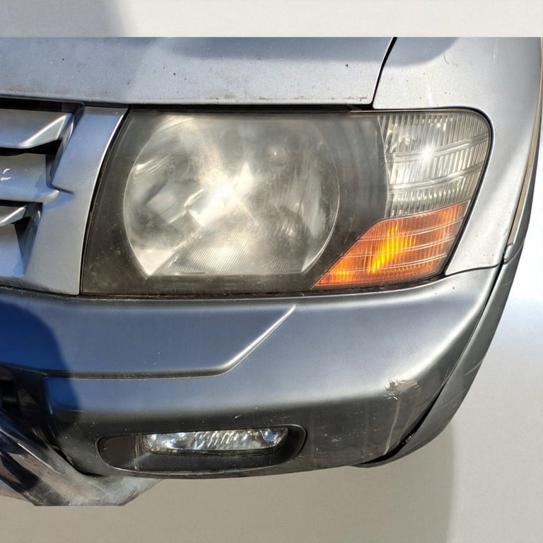 Frontscheinwerfer Mitsubishi Pajero III Links Scheinwerfer Headlight