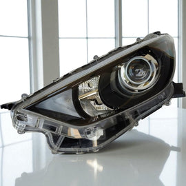 Frontscheinwerfer Mazda IV Yaris Links Scheinwerfer Headlight