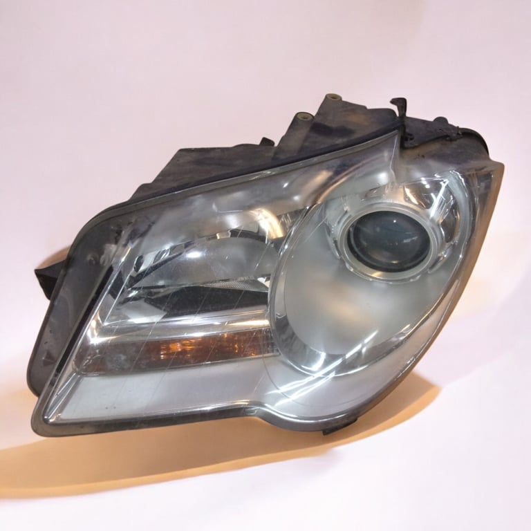 Frontscheinwerfer VW Touran Links Scheinwerfer Headlight