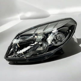 Frontscheinwerfer Dacia Sandero I Links Scheinwerfer Headlight