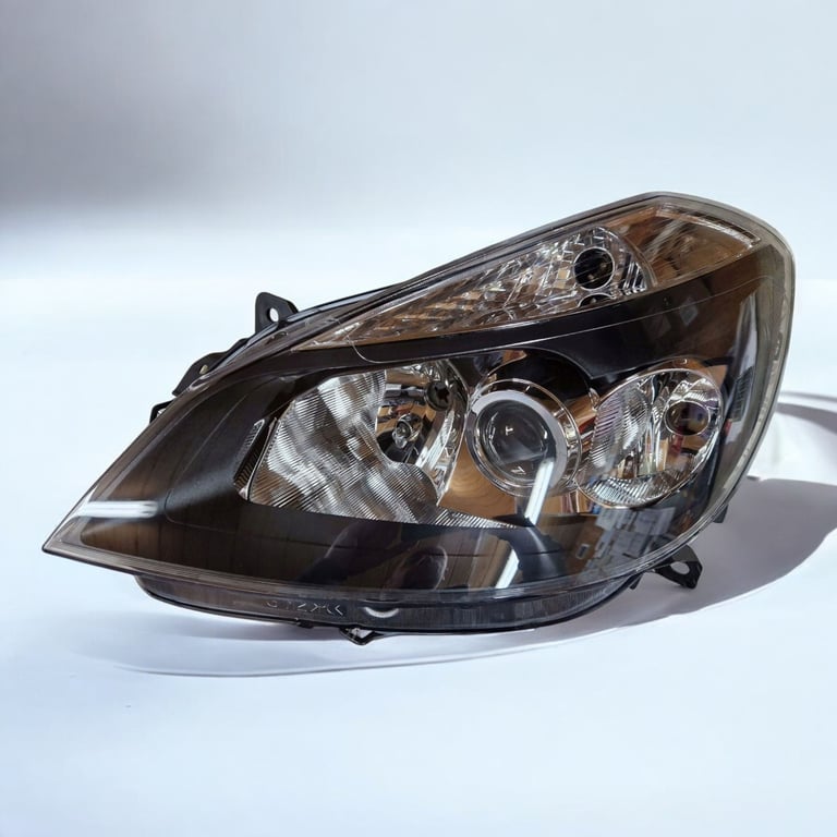 Frontscheinwerfer Renault Clio III 7701070491 Links Scheinwerfer Headlight