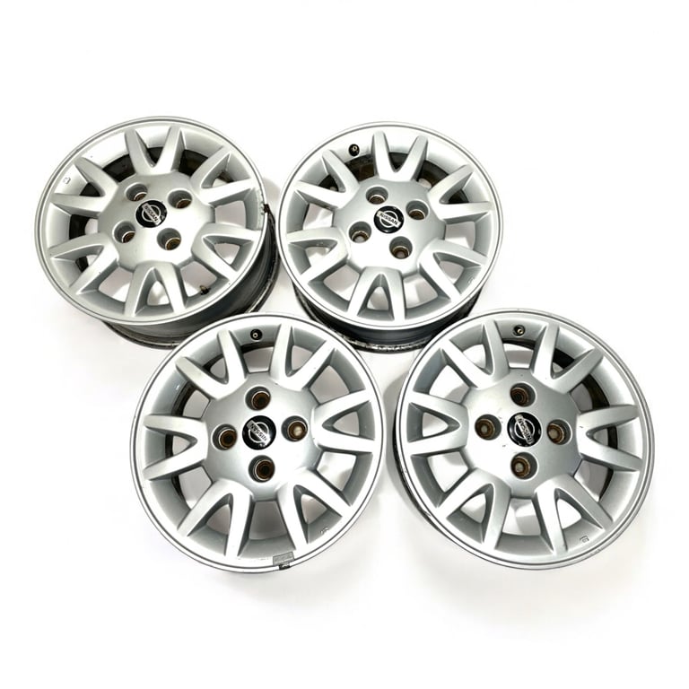 4x Alufelge 15 Zoll 6.0" 4x114.3 45ET Glanz Silber Nissan Primera P11 Almera